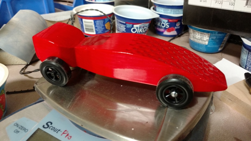 red pinewood derby car